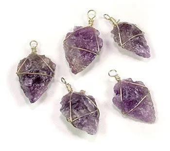Amethyst Pendant. Wire wrapped amethyst arrowhead pendants. Approximately 30mm long.