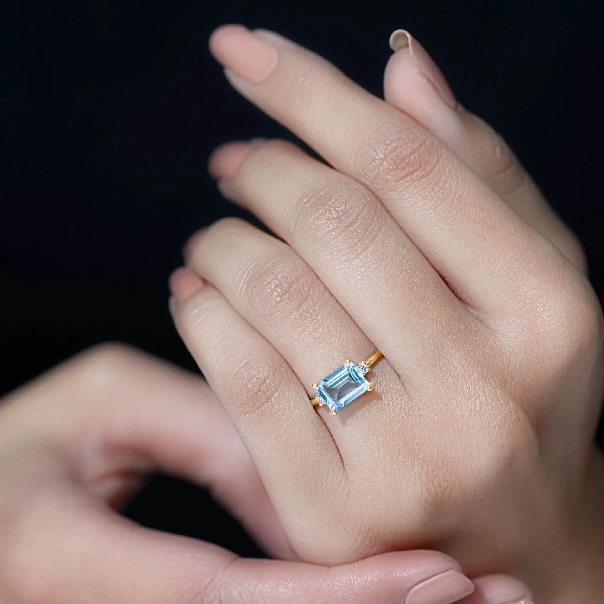 Emerald Cut Sky Blue Topaz East West Engagement Ring with Diamond