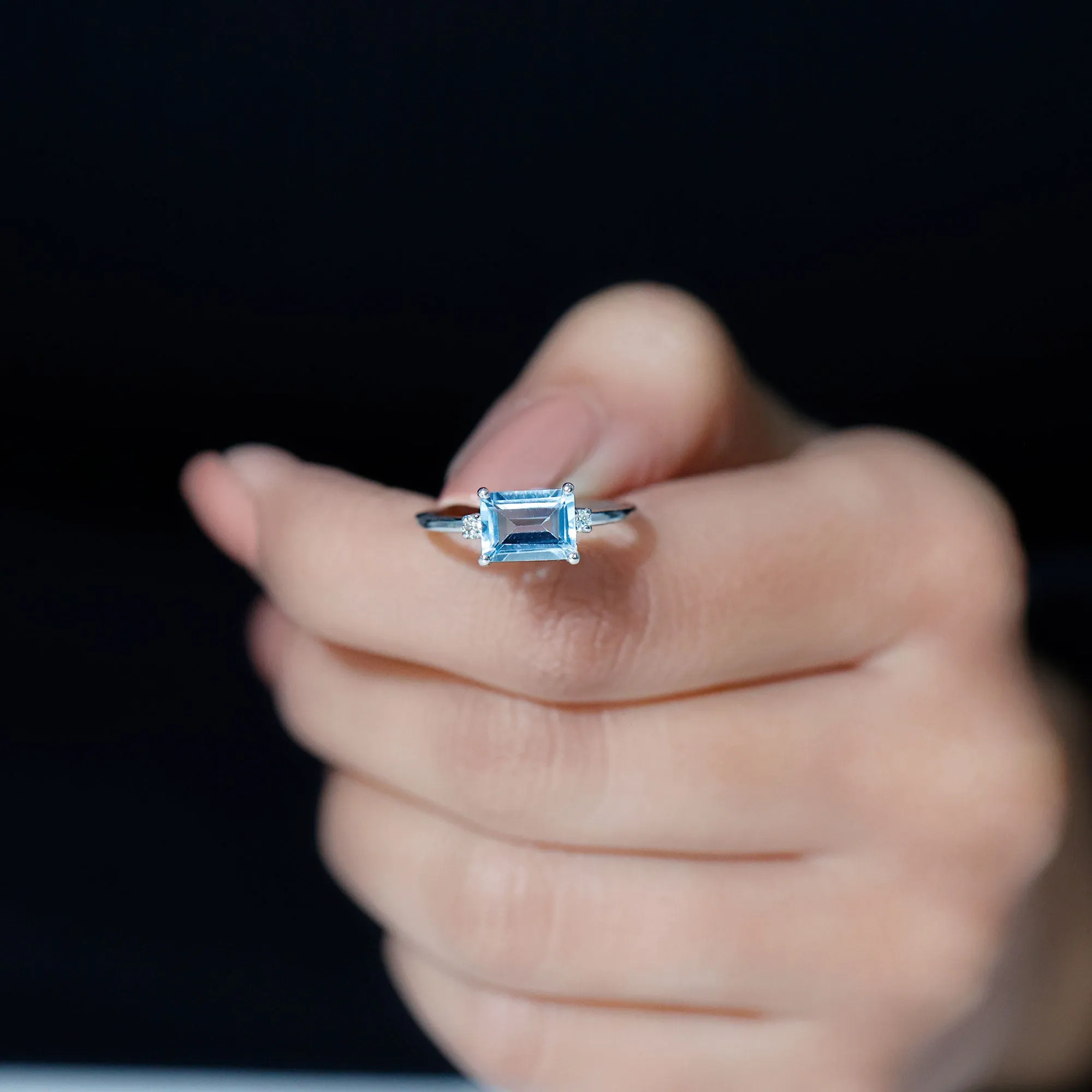 Emerald Cut Sky Blue Topaz East West Engagement Ring with Diamond