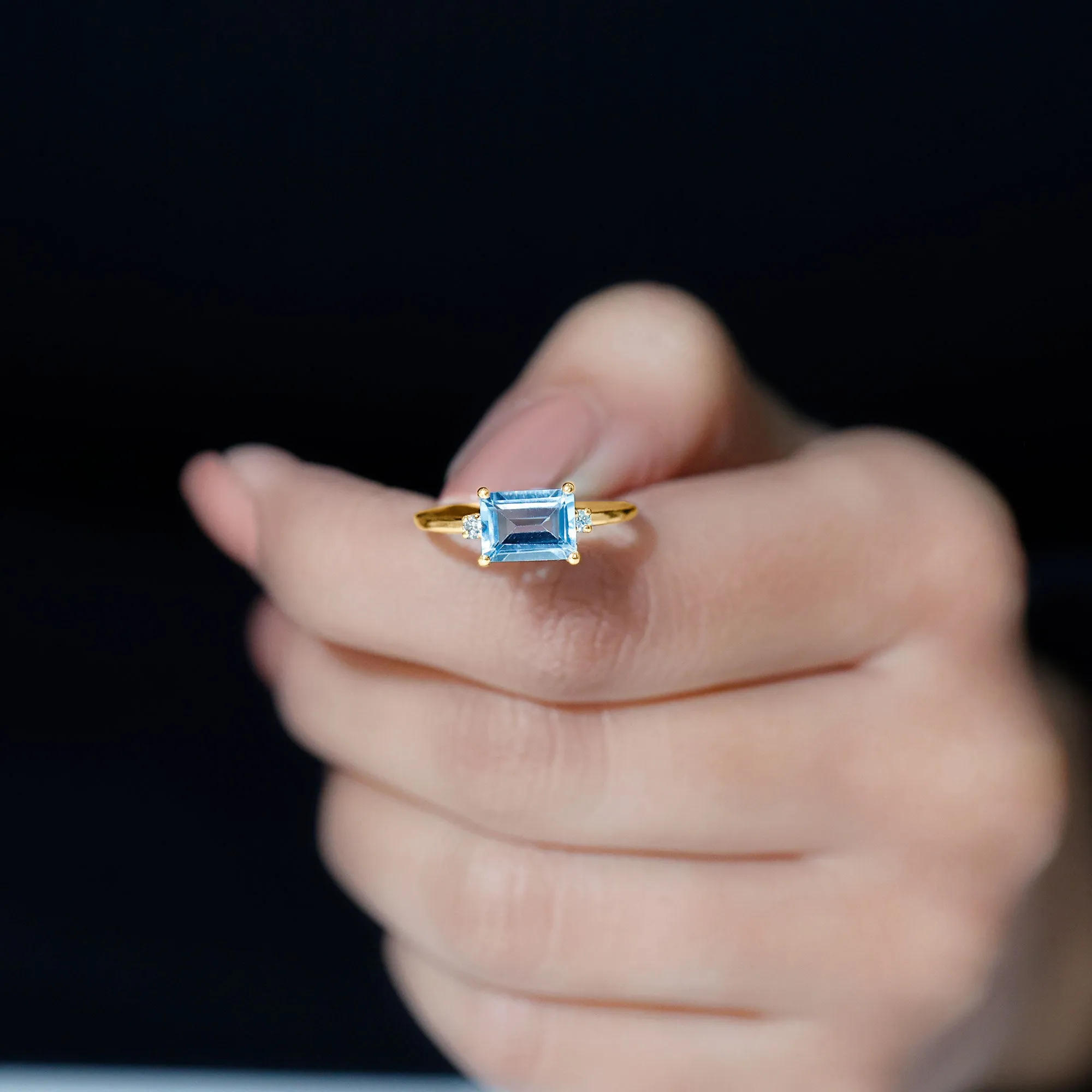 Emerald Cut Sky Blue Topaz East West Engagement Ring with Diamond