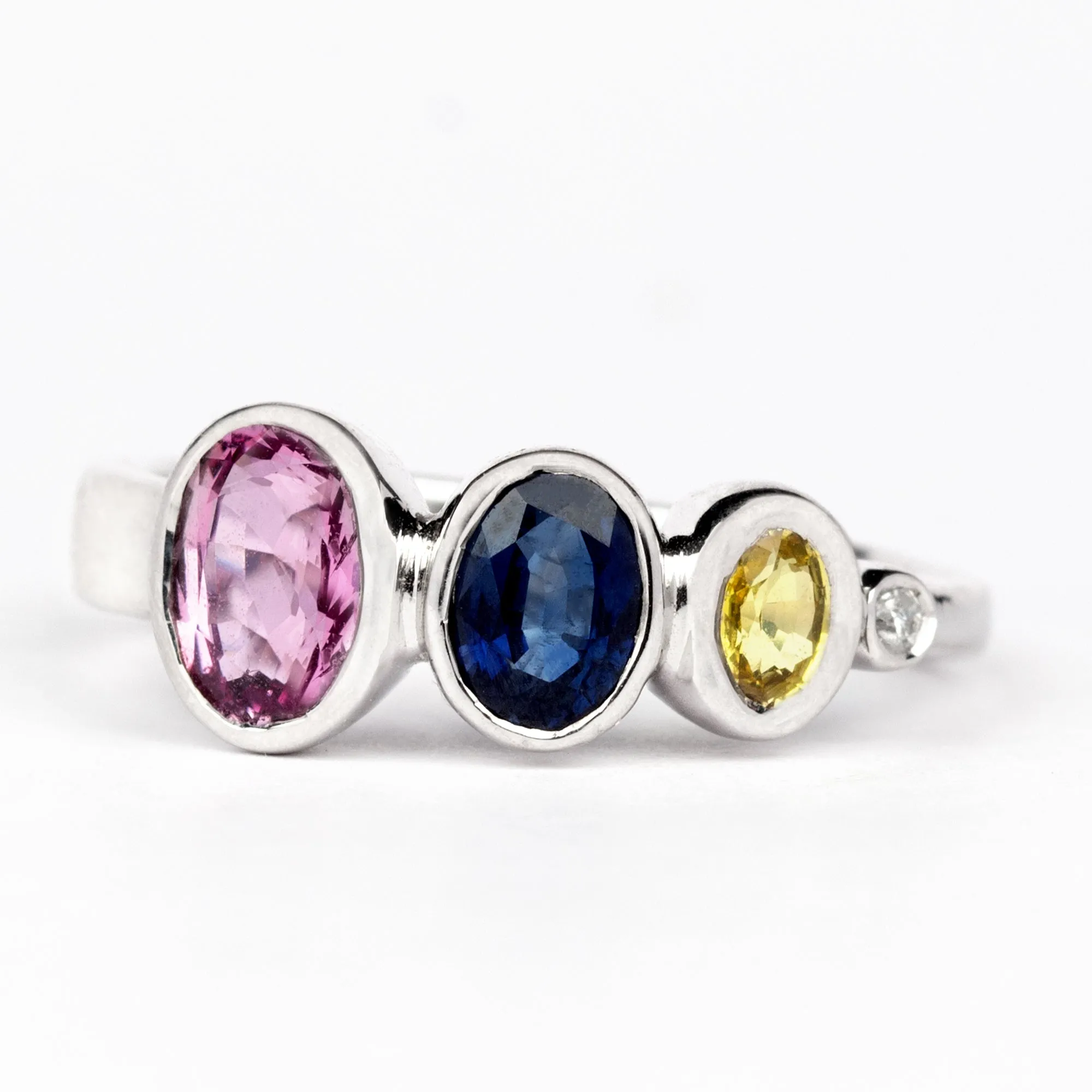 Graduated Style Oval Cut Multi Created Sapphire Ring with Moissanite