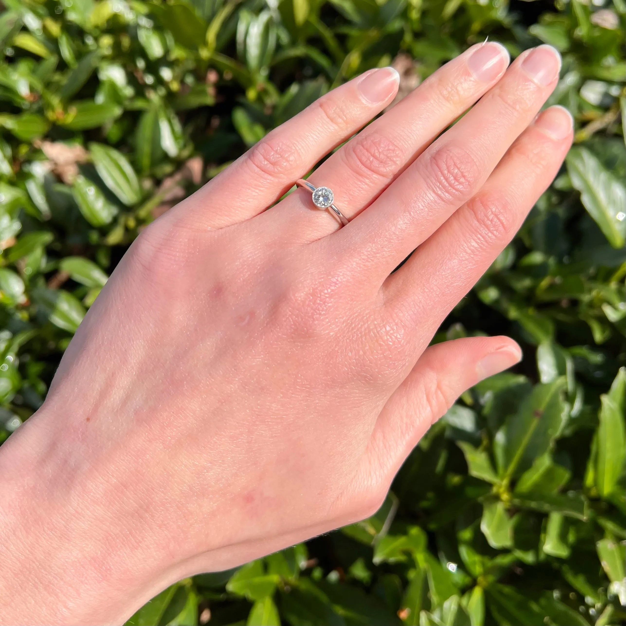 Half Carat Round Brilliant Cut Diamond Solitaire Platinum Bezel Set Engagement Ring