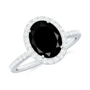 Oval Black Spinel and Diamond Classic Halo Engagement Ring