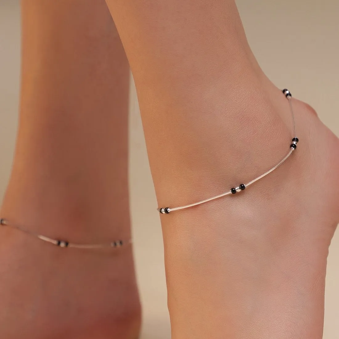Shimmering Harmony: Rhodium-Plated Sterling Silver Anklet with Beaded Accents