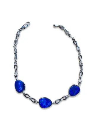 Sterling Silver bracelet with 3 Natural Opal and ironstone backing doublet in bezel set.